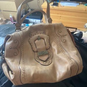 Guess purse. Not sure how old. In good conditions